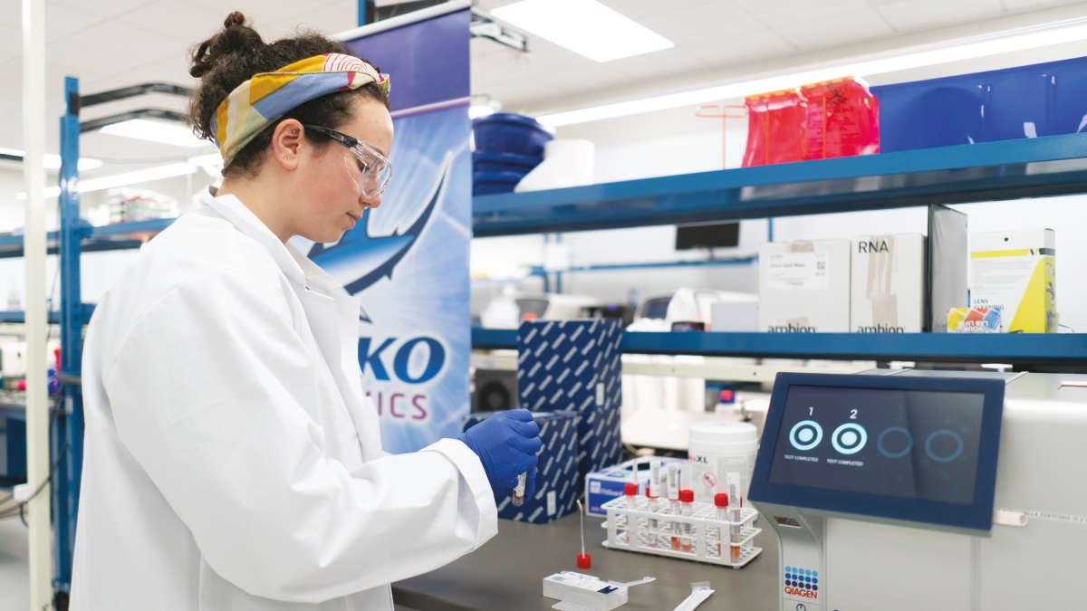 A woman working in a lab