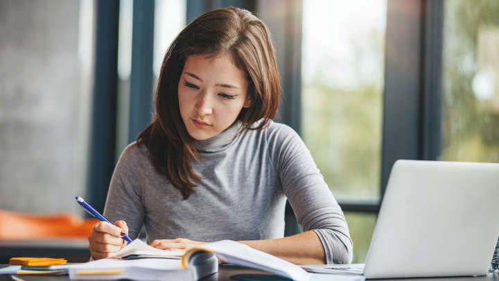 Asian woman working on notes at home , office, laptop, asian girl, notes, focus,