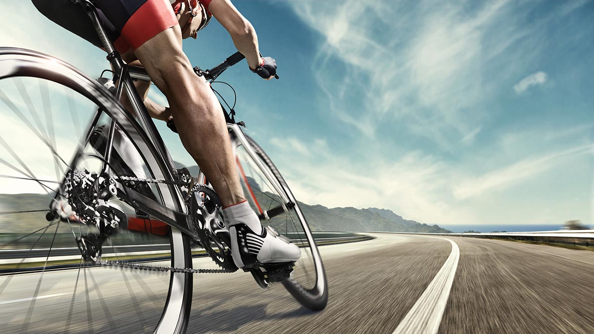 A person riding a bicycle on a road