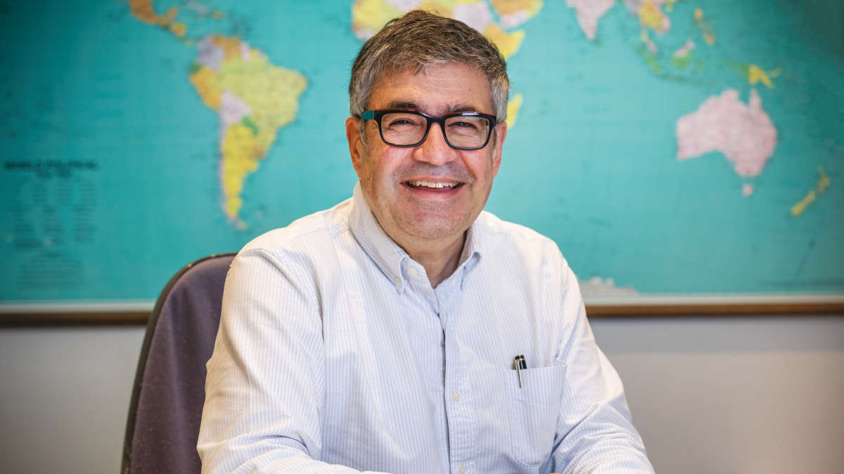 NeuMoDx, Richard Dawood sitting and smiling